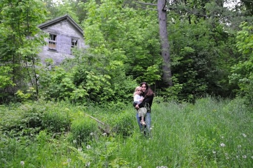 My sister, Hillery Stone and her daughter, Chloe, standing outside the “little house” in Goshen, Vermont.