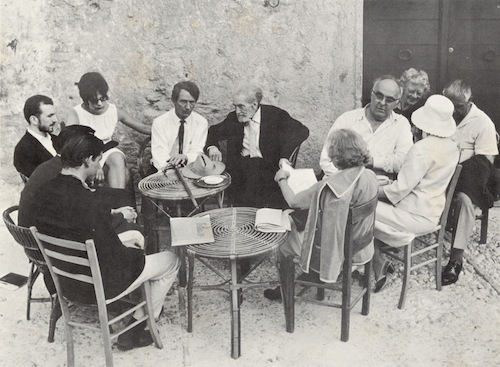 Semicircle, l. to r.: Bill Berkson, John Ashbery, John Wieners, unknown woman, Desmond O’Grady, Ezra Pound, Charles Olson, Olga Rudge (?), 3 others unknown. Settimana di Poesia, Festival of Two Worlds, Spoleto, Italy, June 1965.