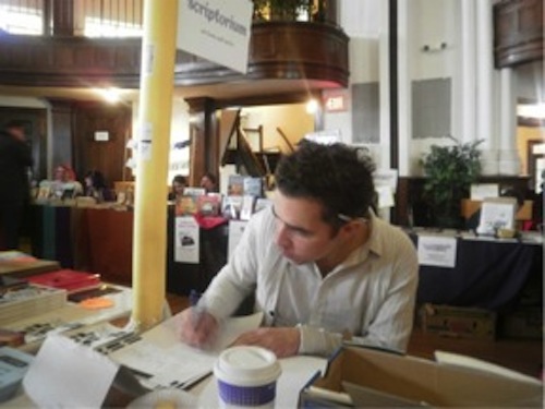 Kaplan Harris me transcribing kari edwards manuscripts for the Scriptorium project at David Hadbawnik's Habenicht Press table.