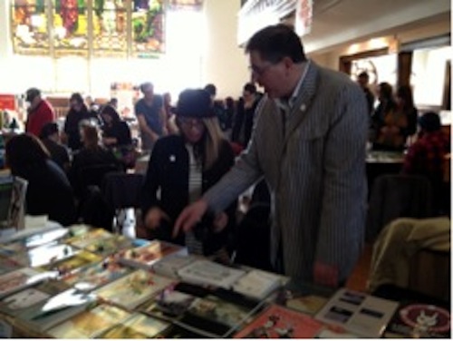 Donna White and Geoffrey Gatzaa at the BlazeVOX table.