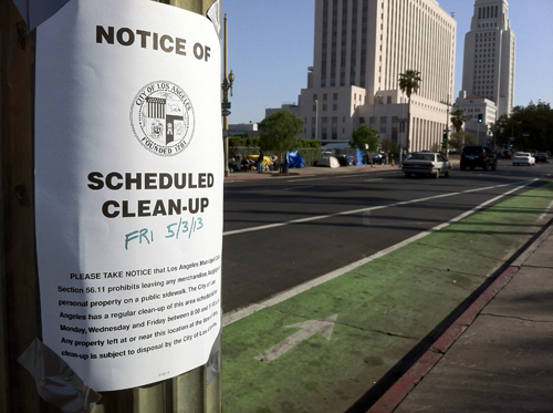 Post-Occupy Homeless encampment along both sides of Spring Street Between César Chávez and Avenue and Arcadia Street in Los Angeles, half a block south of Placita Olvera and one block north of the Federal Courthouse and City Hall (visible in the background). 