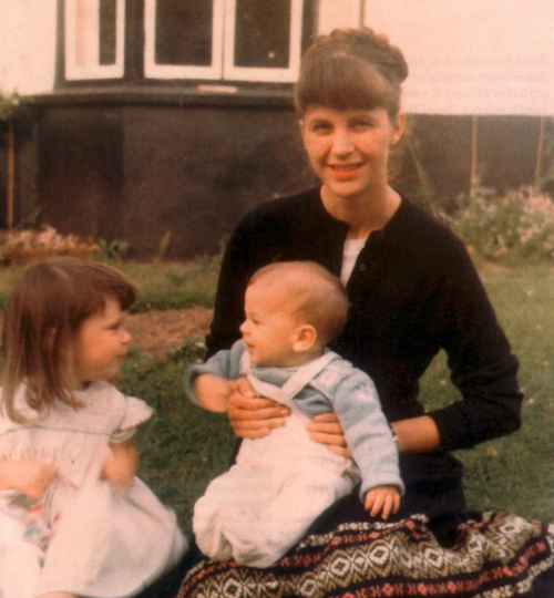 Plath and her children at Court Green, July 1962.  Plath wears her new cashmere sweater and skirt with geometric border.