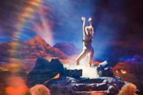 Success at last: Nomi erupts from the Vegas volcano.  Photograph by Frank Mullaney: “Rainbow” (2009).