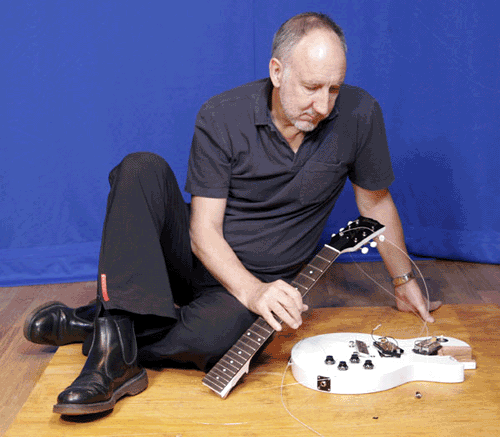 Pete Townshend (old) with smashed guitar