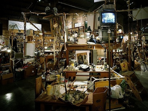 Grosse Tischruine (Large Table Ruin), 1978—1998 (with Björn Roth & Eggert Einarsson), Mixed media installation) Installation view, ‘Dieter Roth, Martin Kippenberger’, Hauser & Wirth Coppermill, London, England, 2006