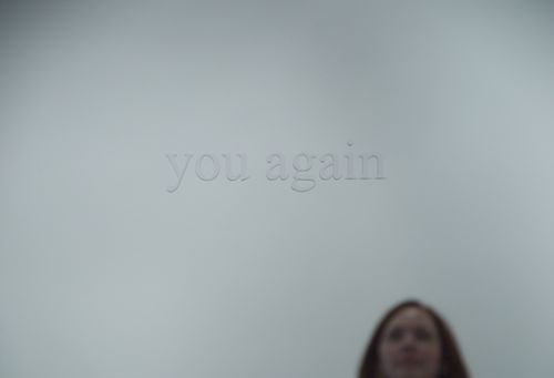 "You Again" by Marina Eckler. Mirrored vinyl on mirrored glass, 2013.
