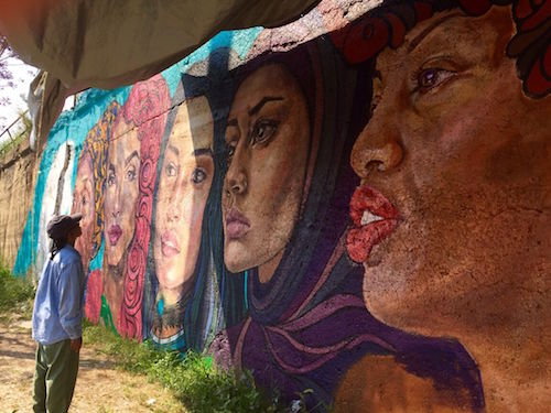 Galeria del Barrio Extension, mural in progress by Sandra Antongiorgi (@santongiorgi) and Samantha Kirk (@iamsamkirk) at 16th & Blue Island, Chicago, IL with Chicago Public Art Group