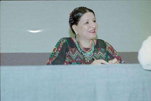 Sandra Cisneros sits at a table at the 2006 Association of Writers and Writing Programs Conference in Austin, Texas. 