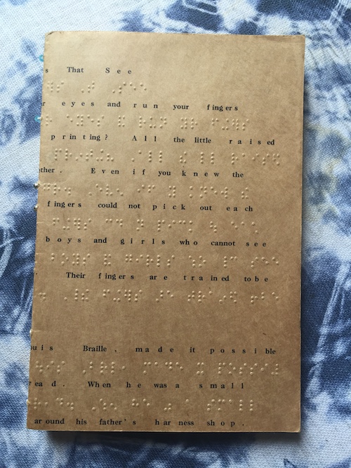 Monica’s Handmade Book, front cover made of document written in Braille